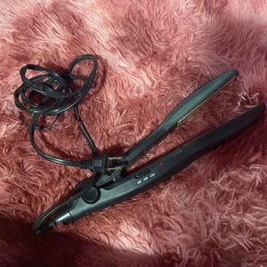 remington hair straightener, black color, wet/dry/off button.